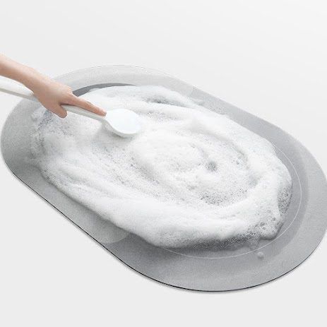 Absorbent floor mat